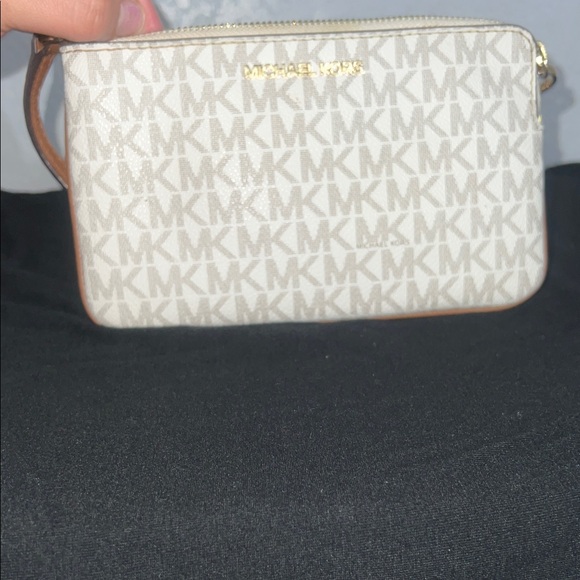 Michael Kors Handbags - Michael Kors Tan Monogram Clutch